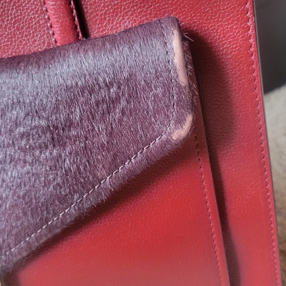 Kate Spade elegant burgundy and purple handbag